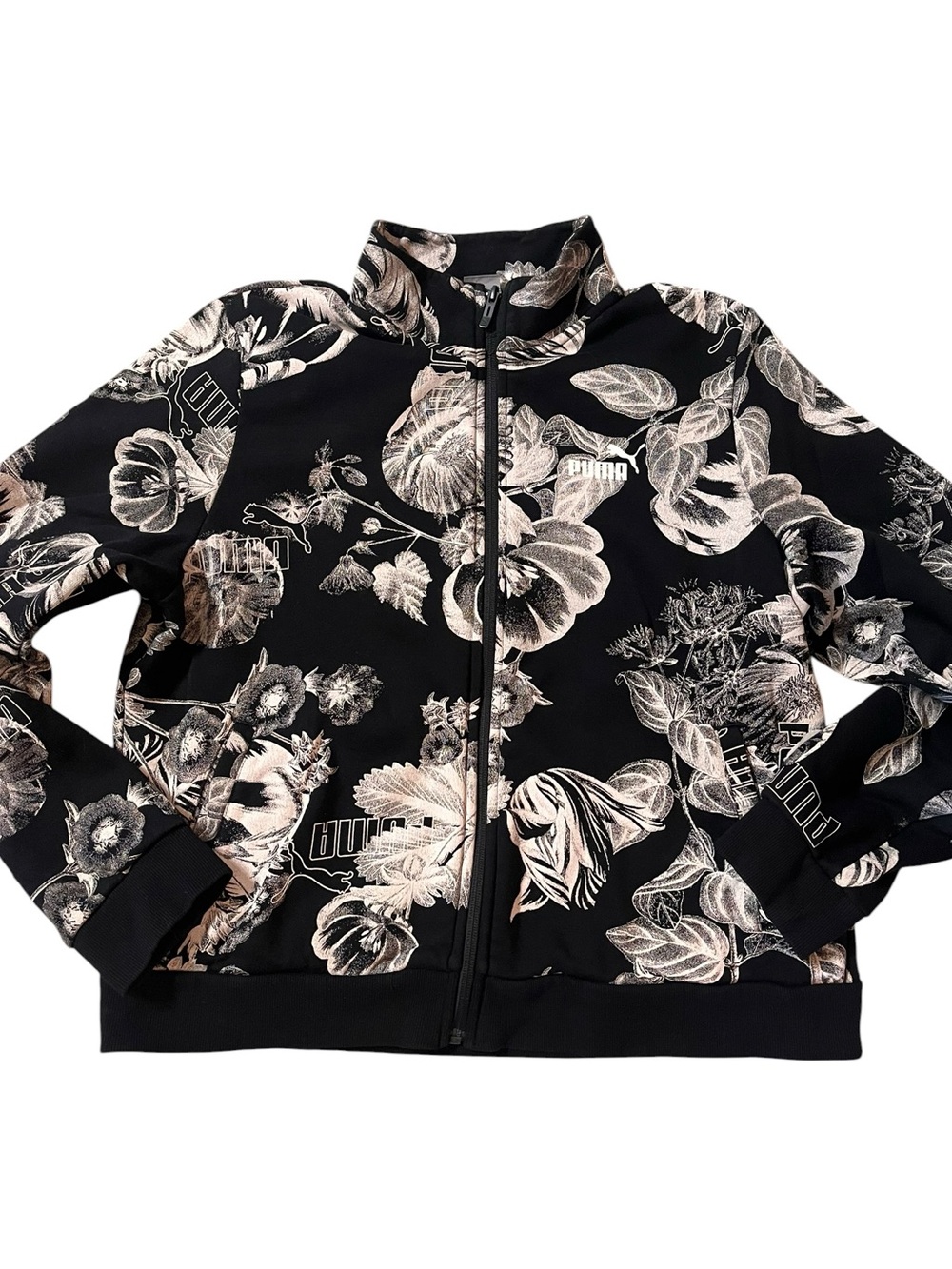 Puma Black Jacket with Cream Floral Graphics
Zip Up
Unique
XL